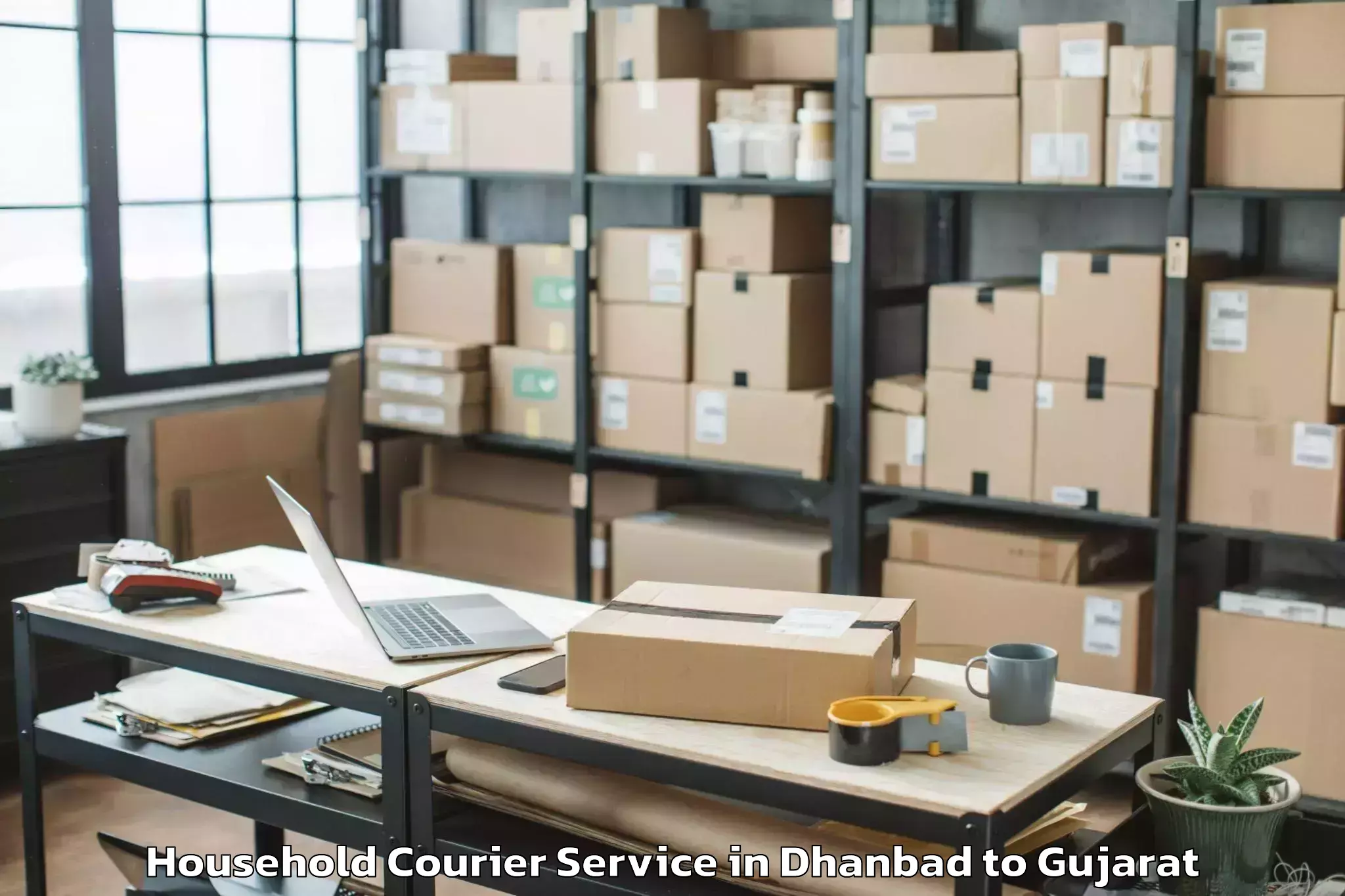 Trusted Dhanbad to Gandhinagar Household Courier